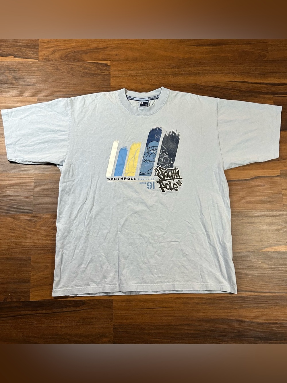 Vintage made in USA Y2K South Pole Light Blue Graphic Tee with graffiti accents